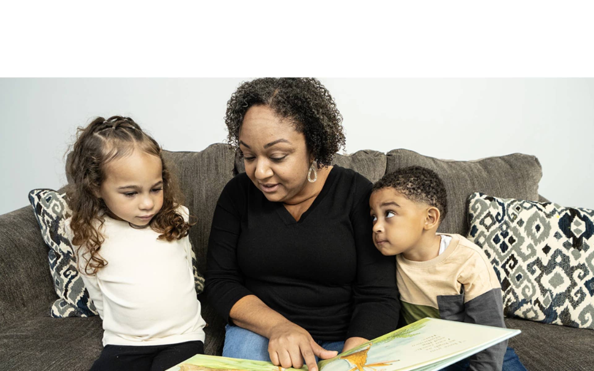 Boys Town Staff reading to children